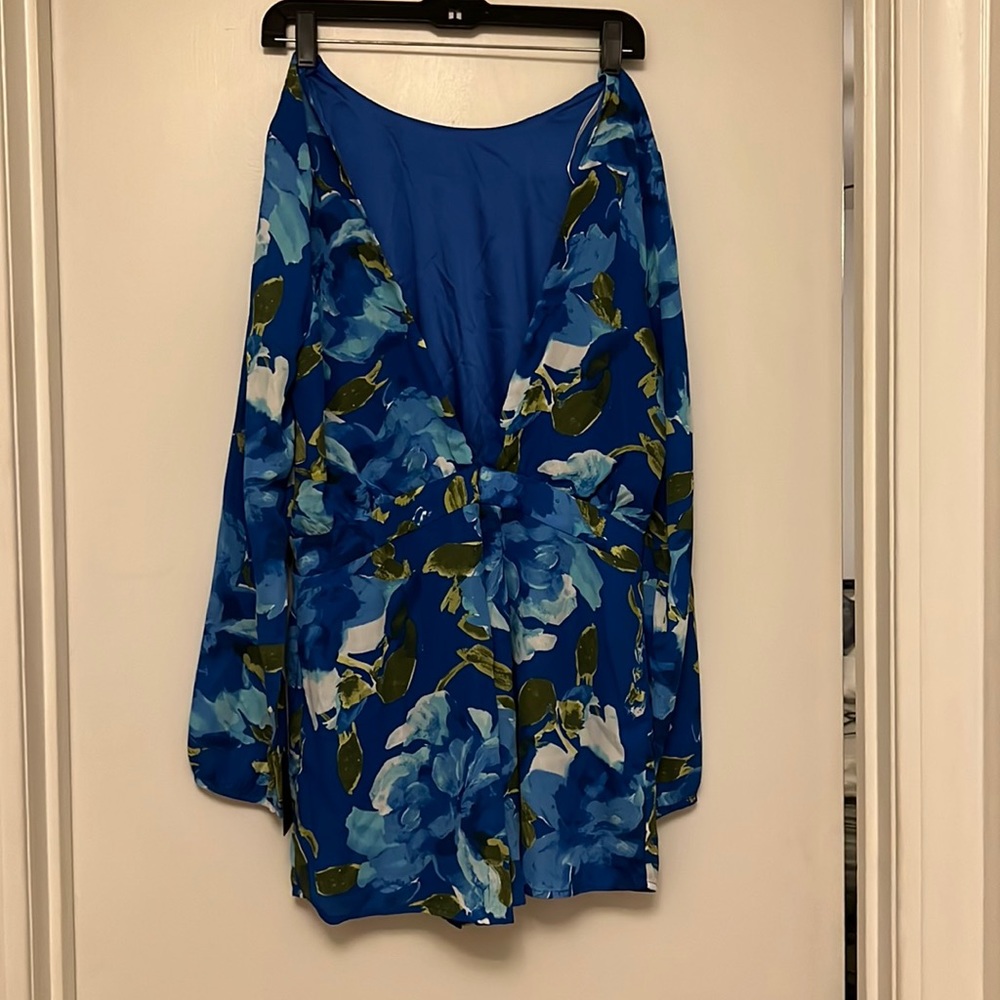 Lulu’s blue floral romper (L) with tags